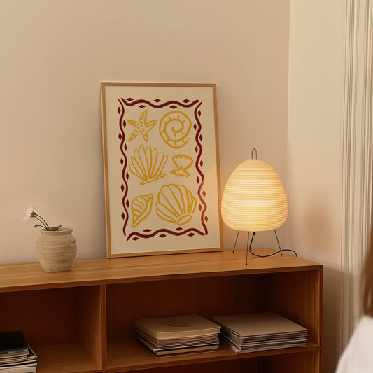 hand-drawn golden seashells starfish dark red decorative border cream background coastal art print