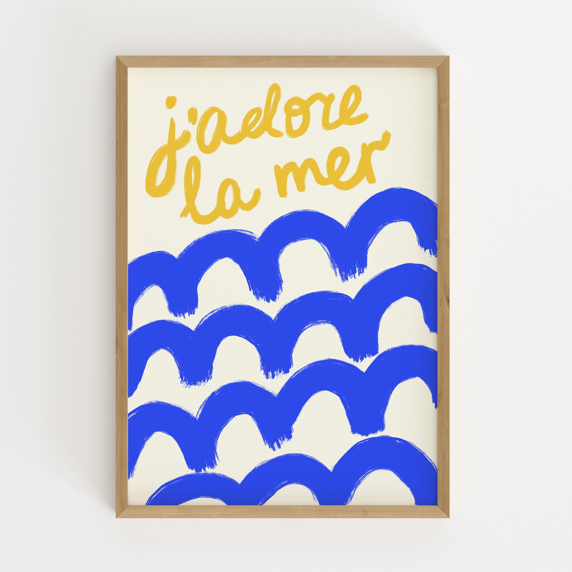 hand-drawn bold blue waves golden yellow j'adore la mer lettering cream background French coastal art print