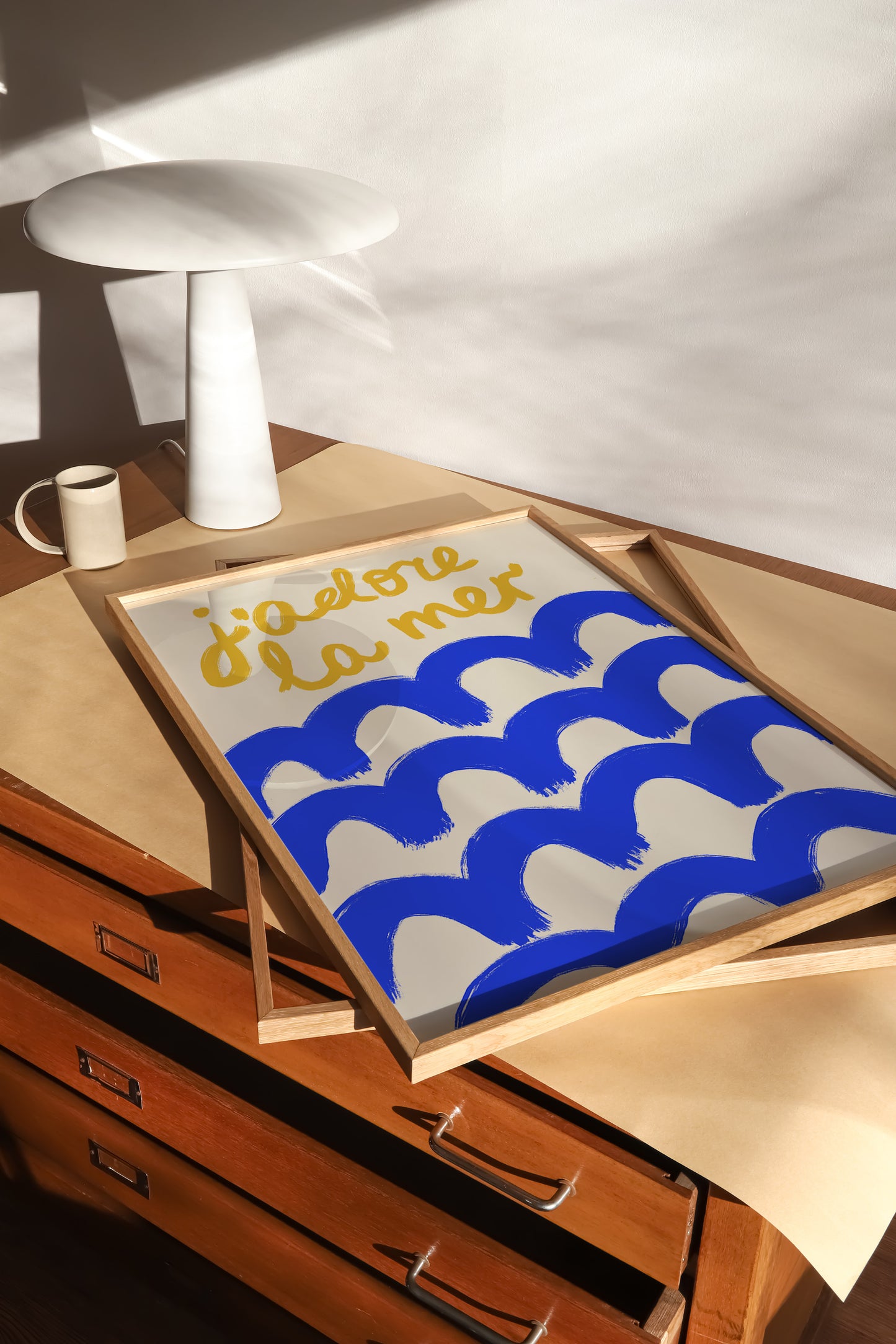 hand-drawn bold blue waves golden yellow j'adore la mer lettering cream background French coastal art print