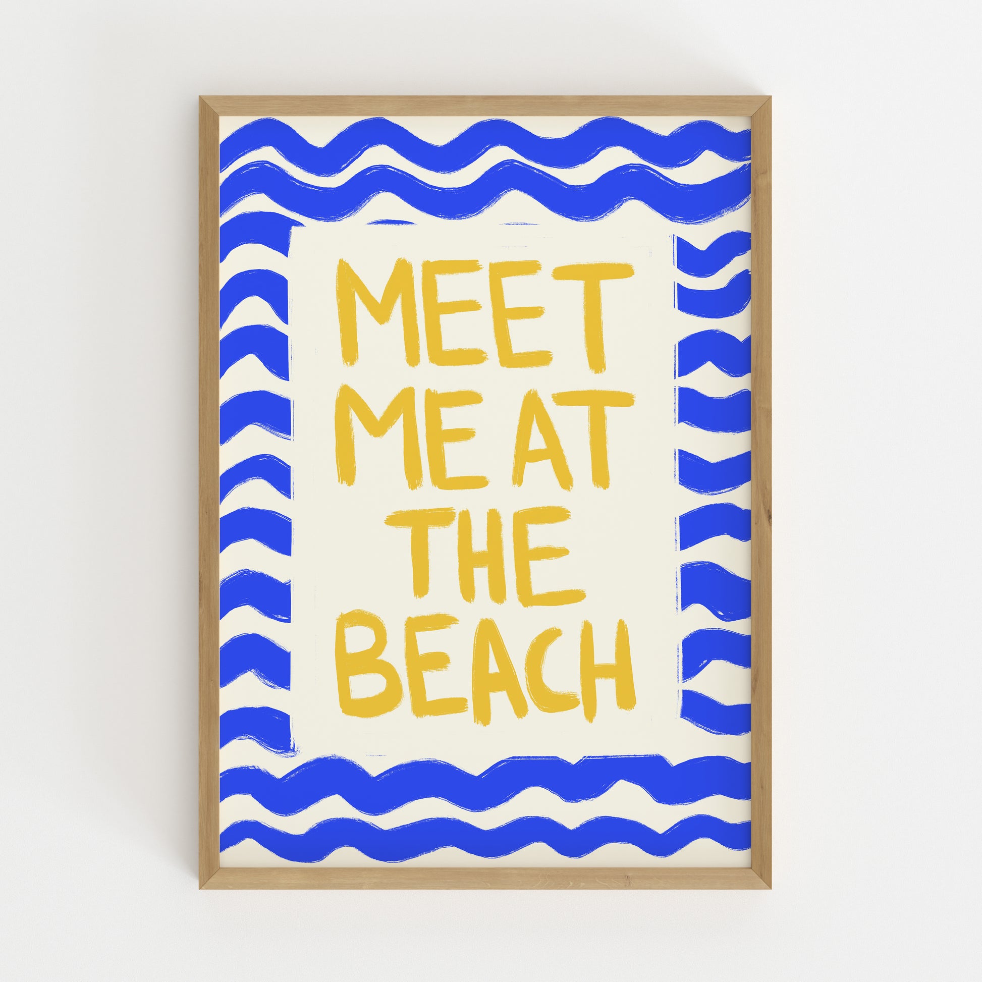 hand-drawn golden yellow meet me at the beach lettering blue wave border cream background art print