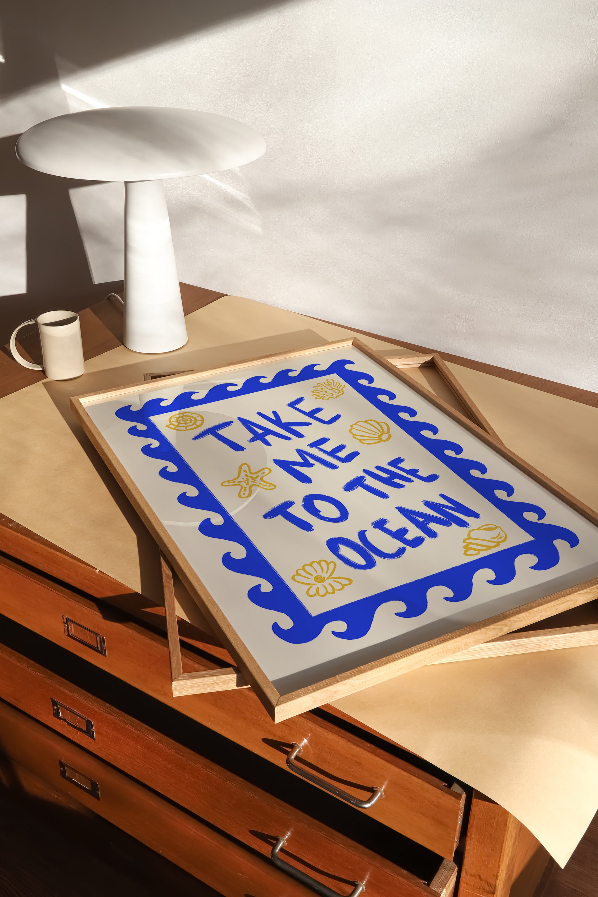hand-drawn bold blue take me to the ocean lettering wave border golden seashells cream background art print